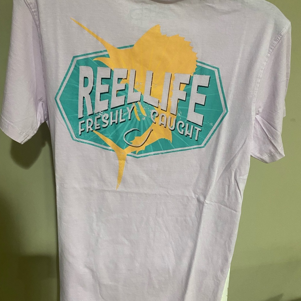 Real Life Lavender Short Sleeve Tee. Brand new with tags. Size small